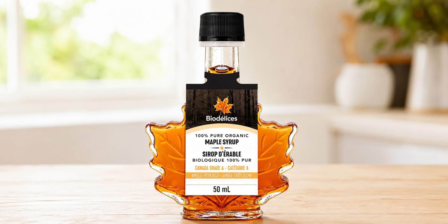 Pure Canadian maple syrup being poured over a stack of pancakes