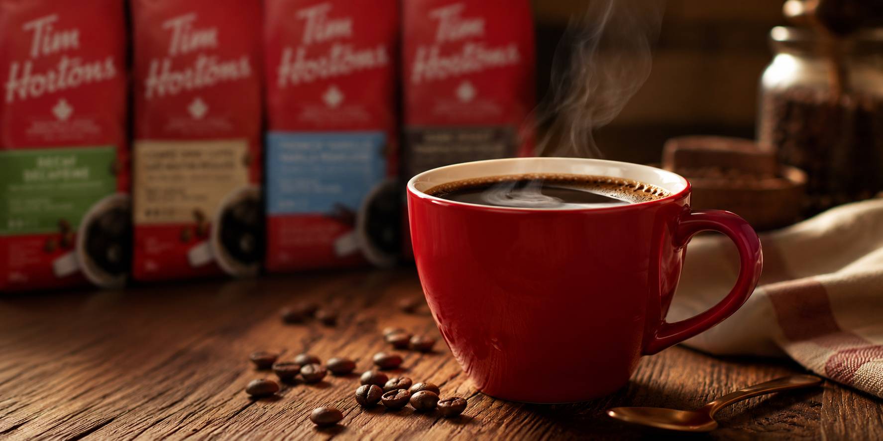 Coffee beans being poured into a grinder