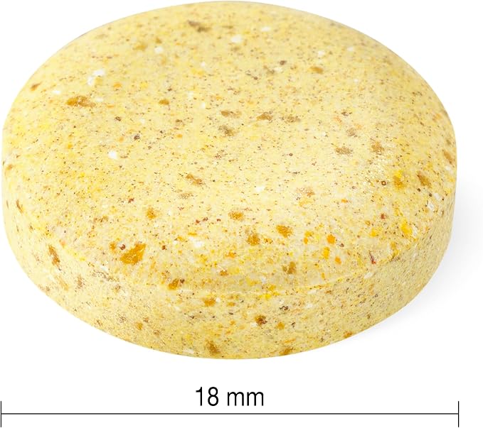 Close-up of Jamieson chewable multivitamin tablet showing approximately 18 mm tablet diameter