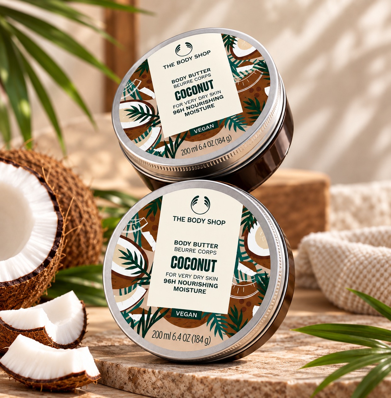 The Body Shop Coconut Body Butter shown with its rich creamy