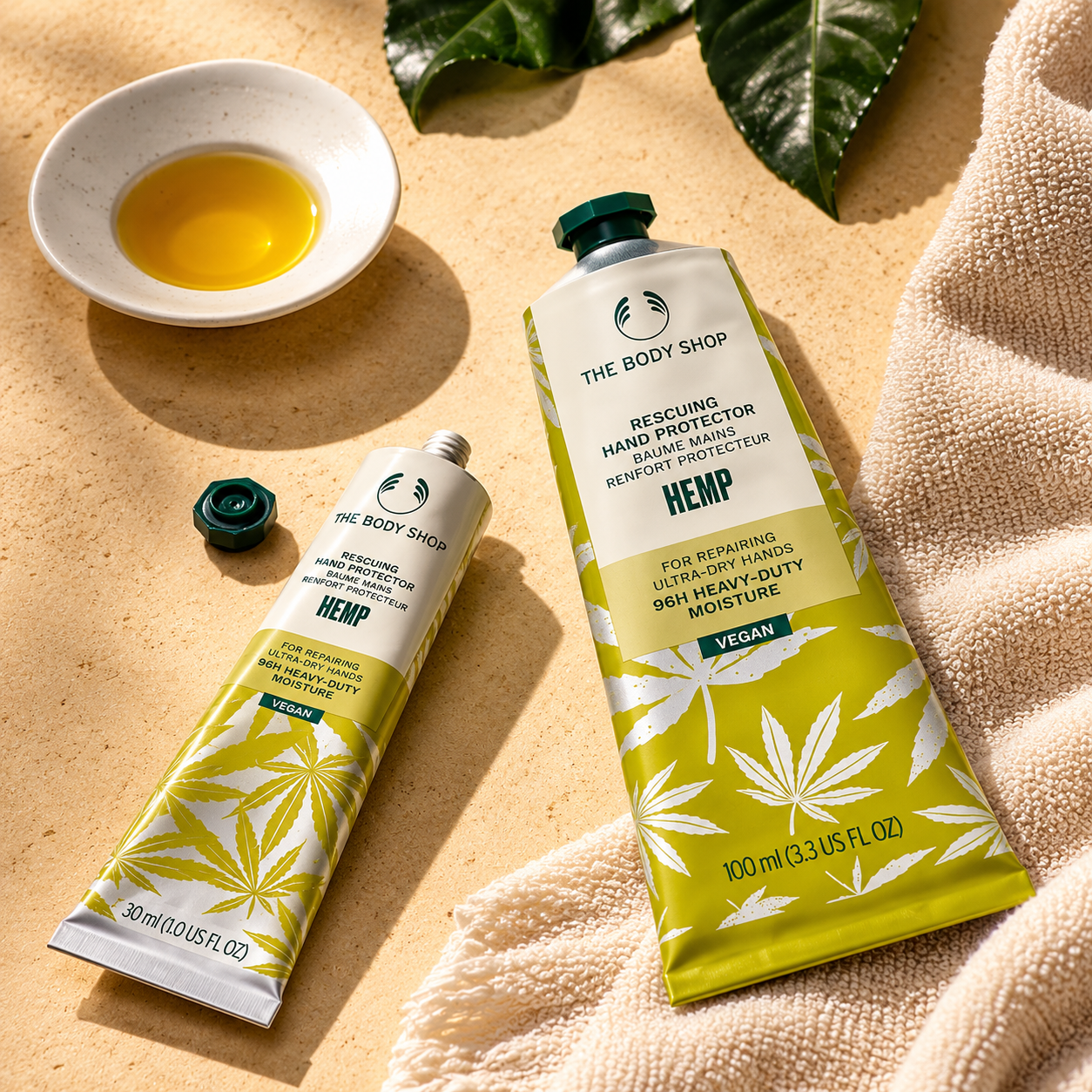 The Body Shop Hemp Hand Protector 30ml and 100ml tubes with hemp seed oil and towel